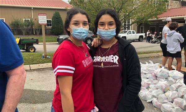 Two girls smile